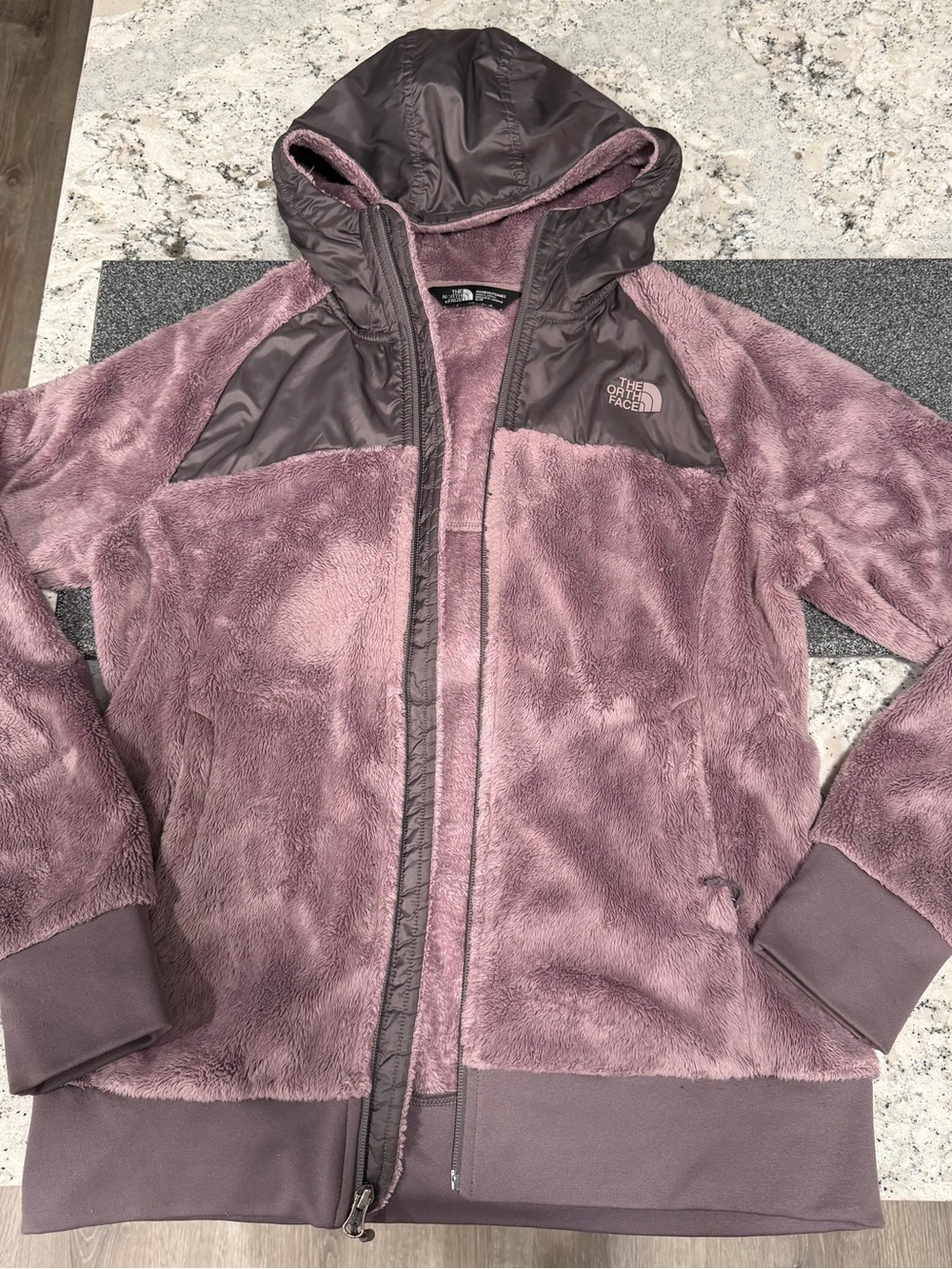 The North Face womans Plush Hooded Jacket in purple plum